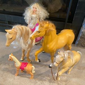 Toy horses. And a barbie doll.